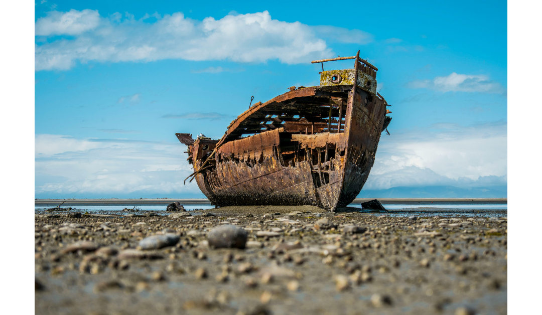 image of abandoned ship on shore